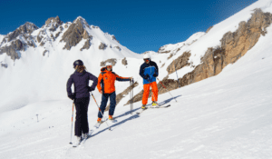3 Skiers in a ski lesson